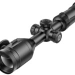 Digital riflescope with adjustable magnification and lens cover, designed for day and night use.